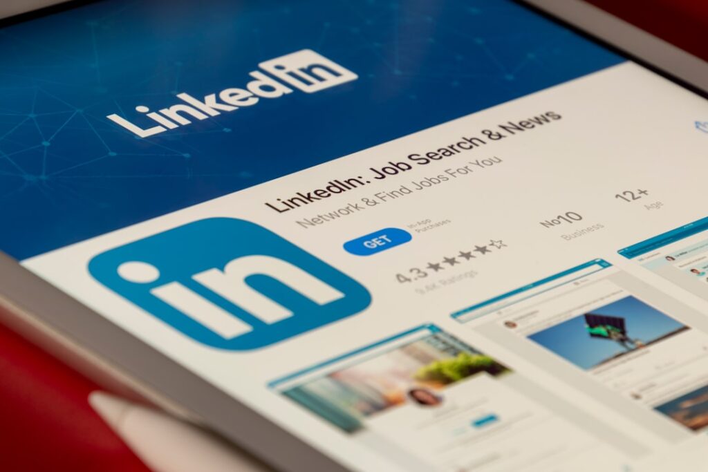 LinkedIn social media platform interface on tablet for business promotion and marketing measurement